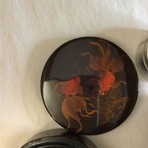 Charming jewelry box lacquer finish. Gold fish design
